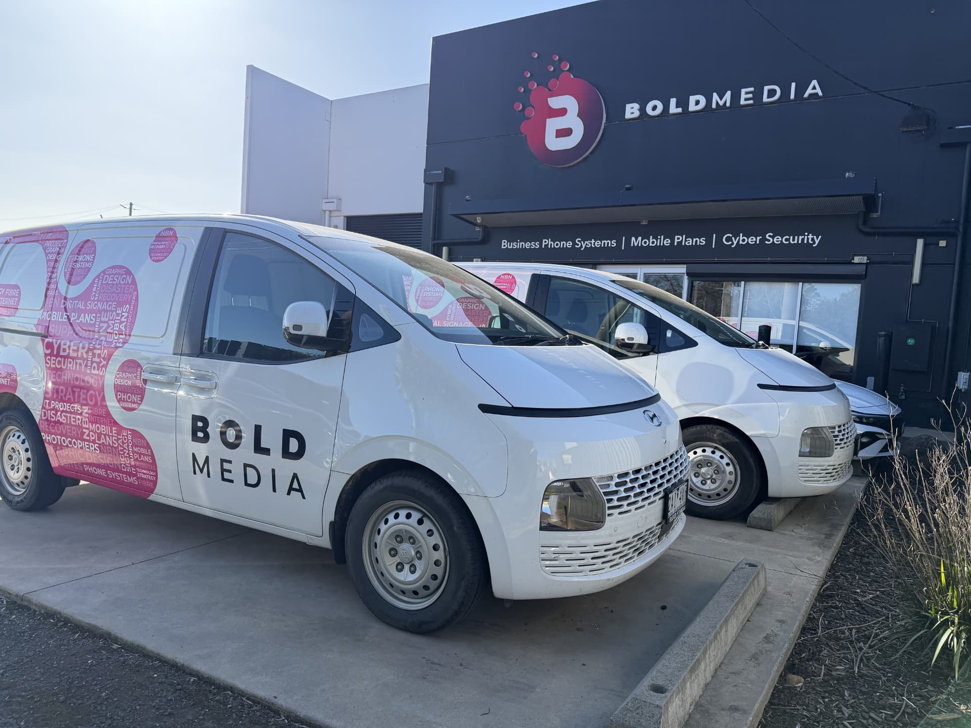 Bold Media vans outside the Bold Media office